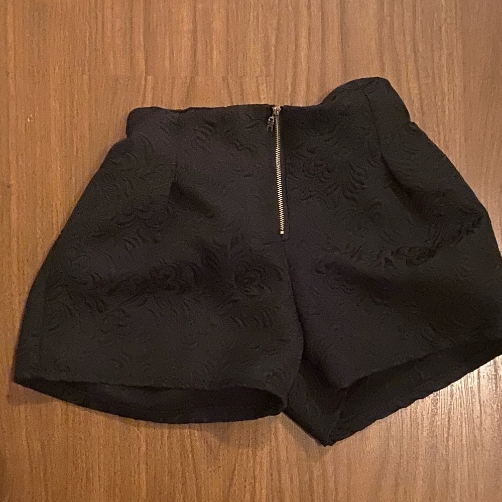 Black textured shorts with zipper